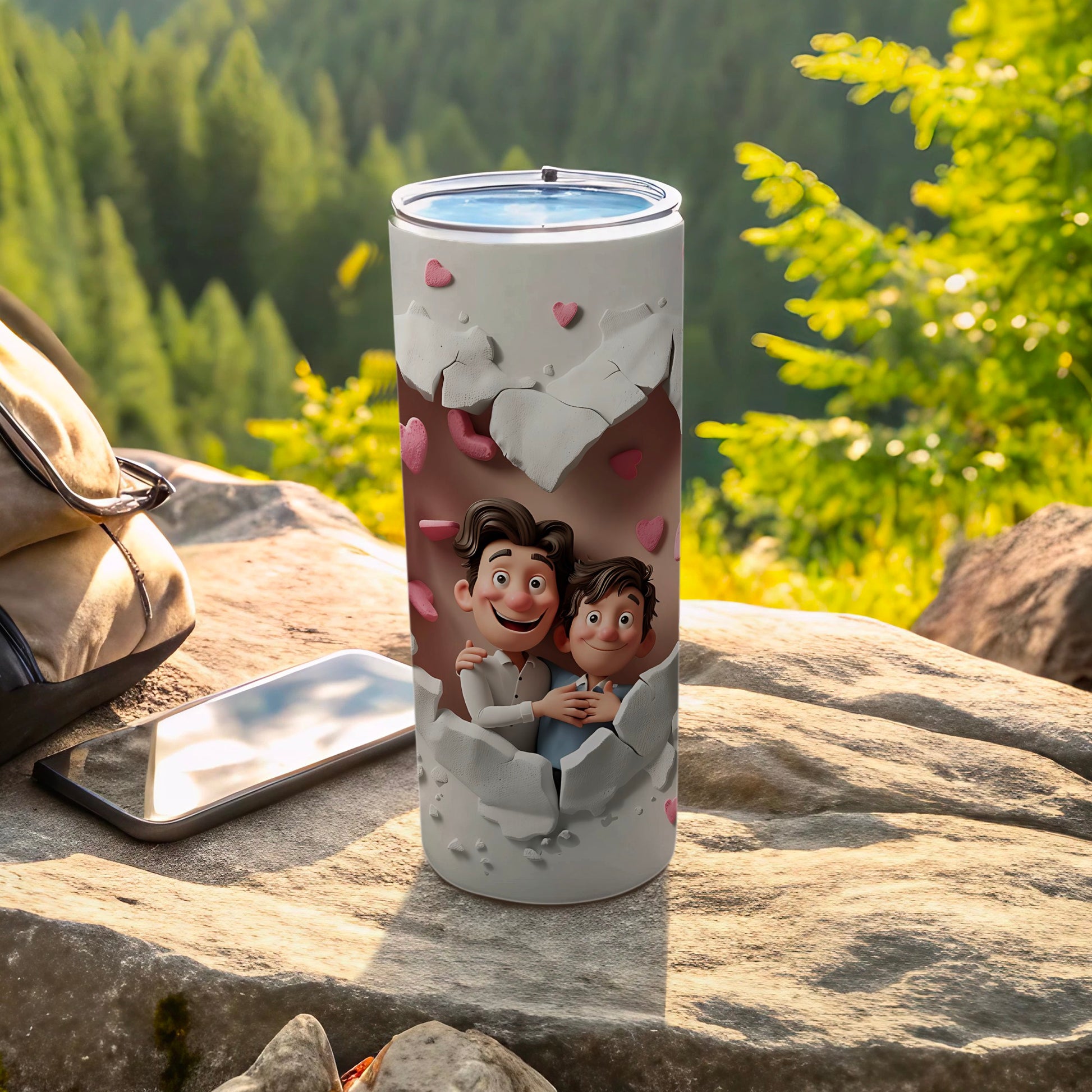 Two men embrace as they break through a cracked heart design on a tumbler.