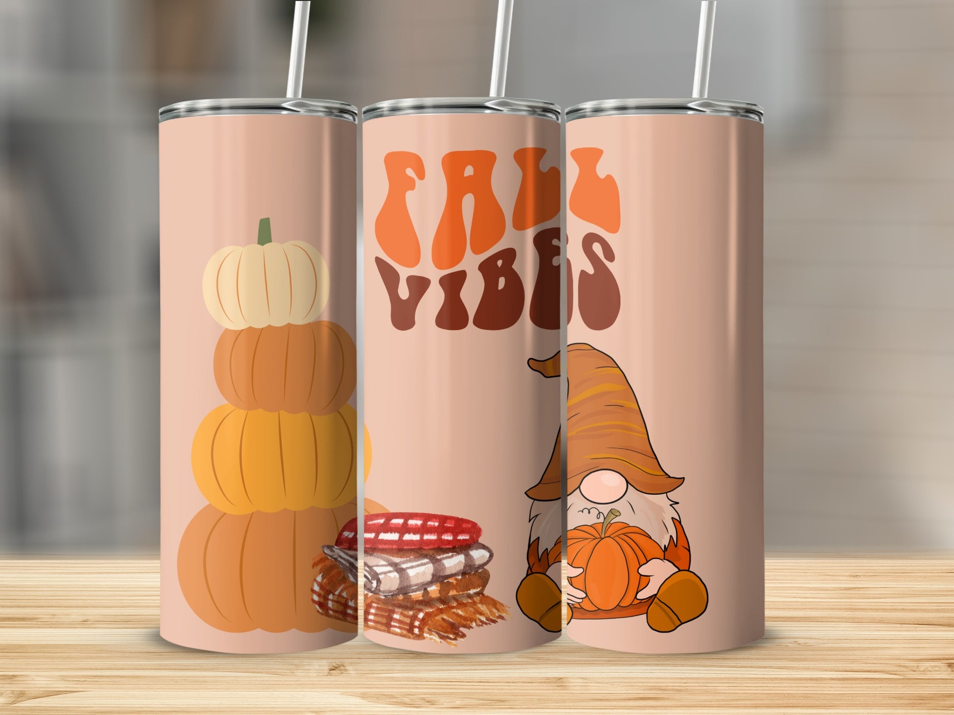 Tumbler with stacked pumpkins, plaid, and gnome holding pumpkin.