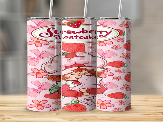 Strawberry Shortcake character holding a pink plush strawberry on a pink background.