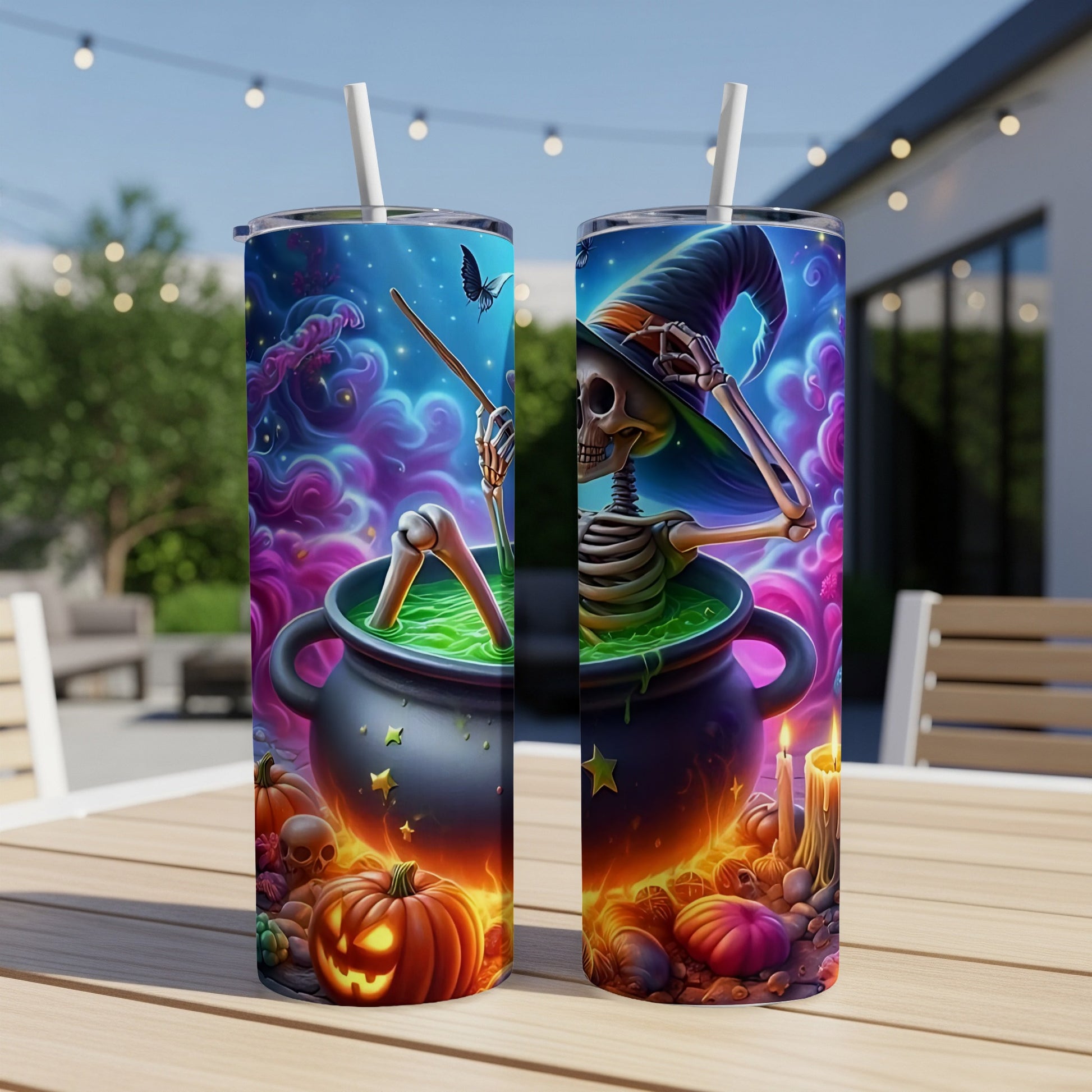 Two tumblers with Halloween-themed art of a skeleton in a cauldron and pumpkins.