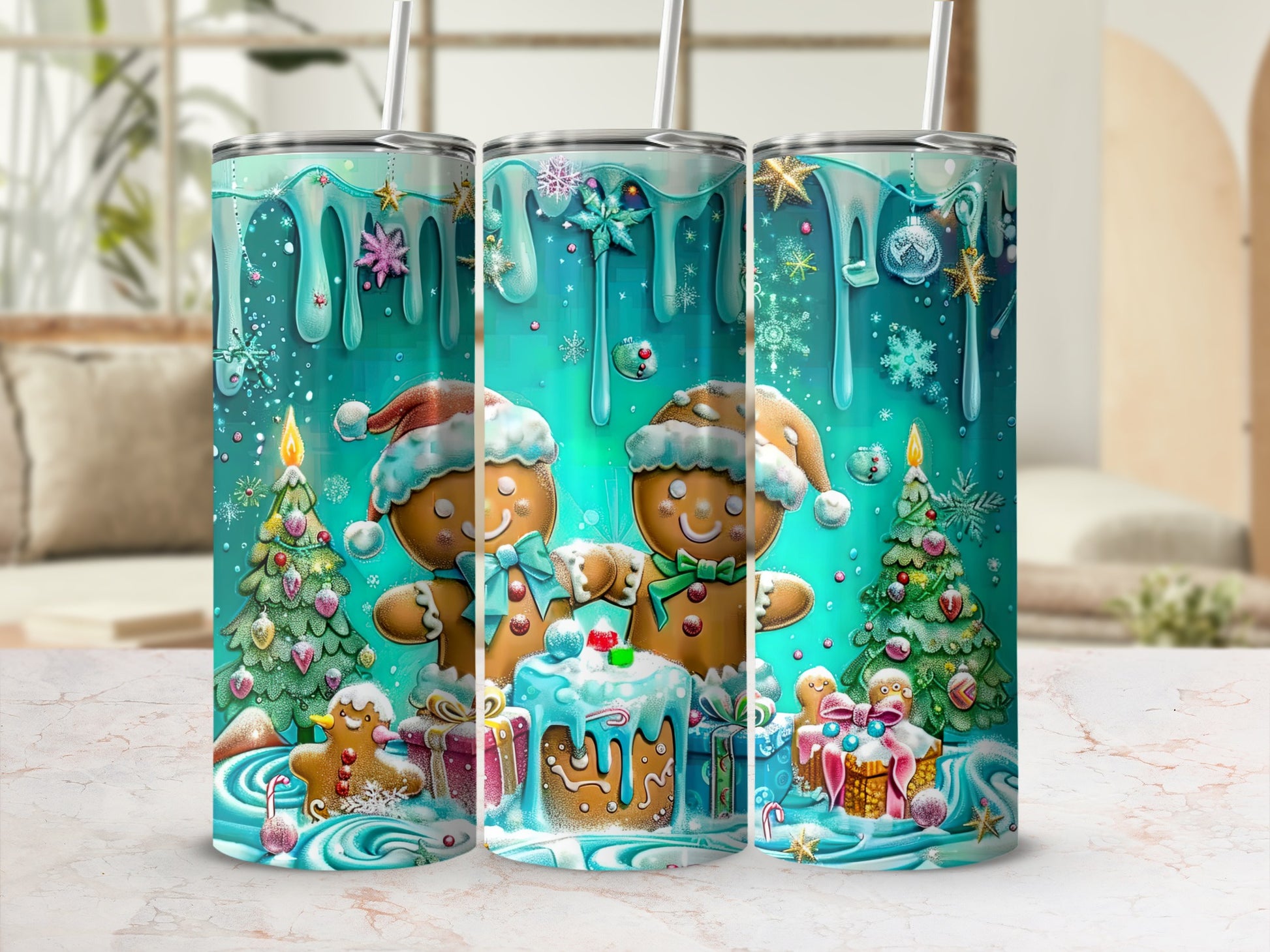 Three tumblers with gingerbread men, Christmas trees, and snowflakes.