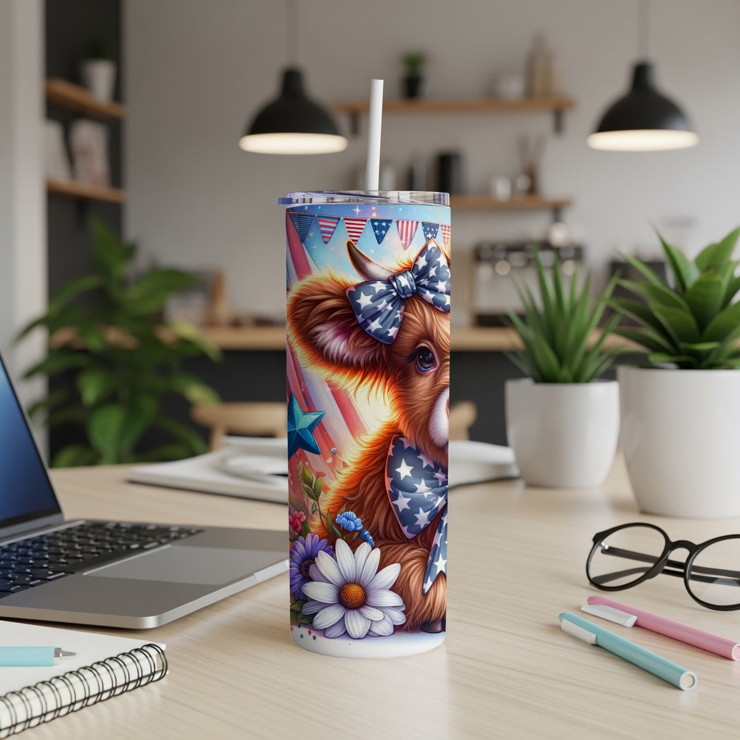 Tumbler with patriotic cow wearing a bow tie, stars, and flowers.