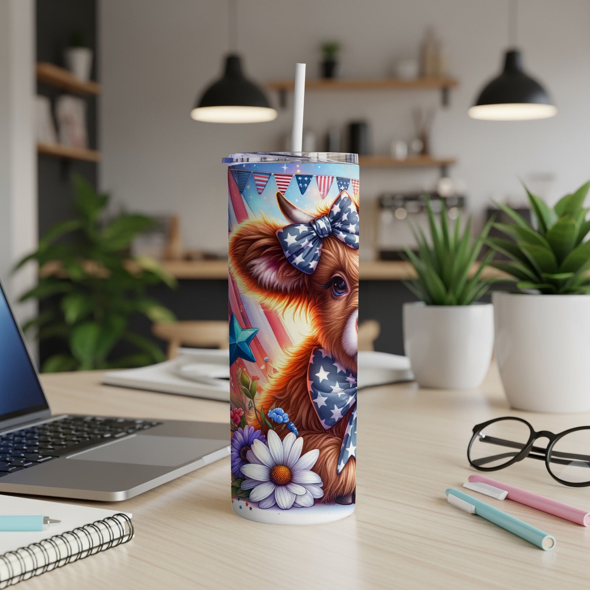 Tumbler with patriotic cow wearing a bow tie, stars, and flowers.