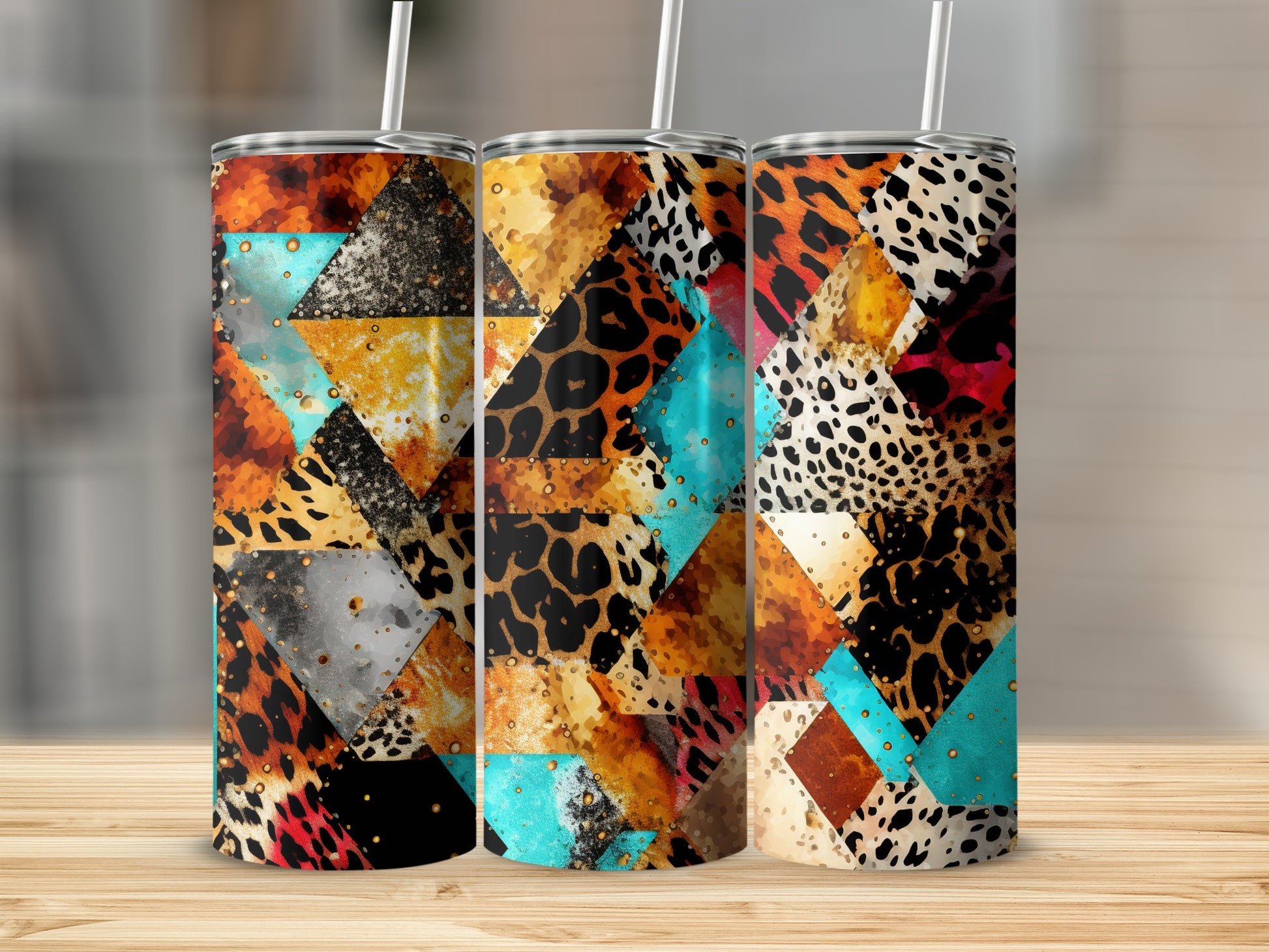 Three tumblers with a collage of animal print and geometric patterns.