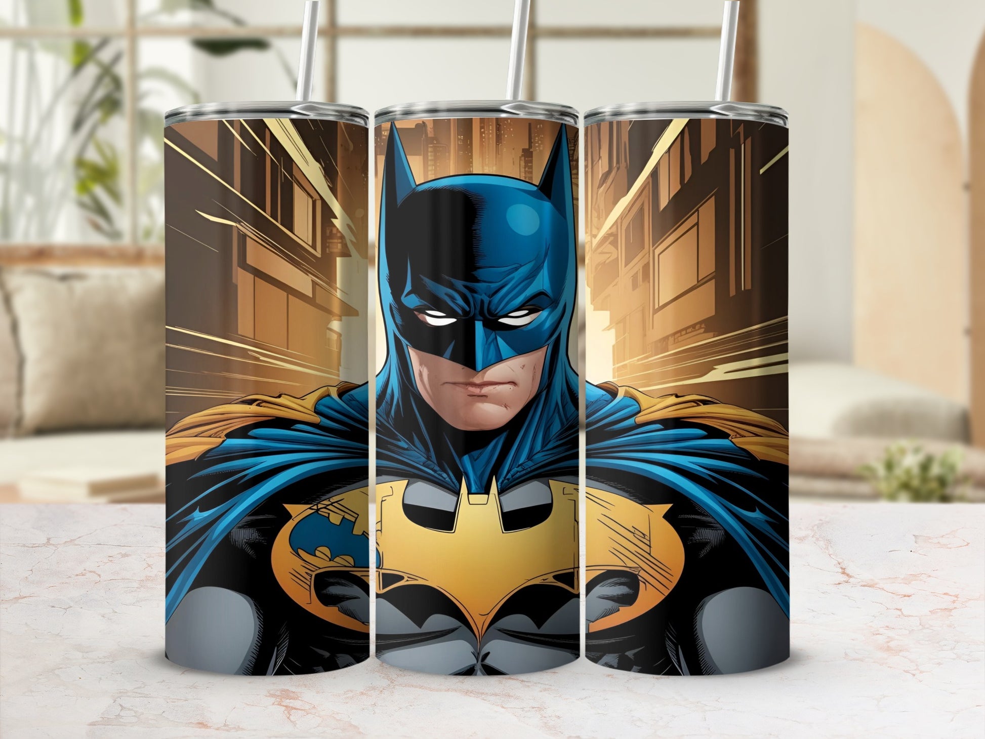 Batman tumbler with a cityscape background and a straw.
