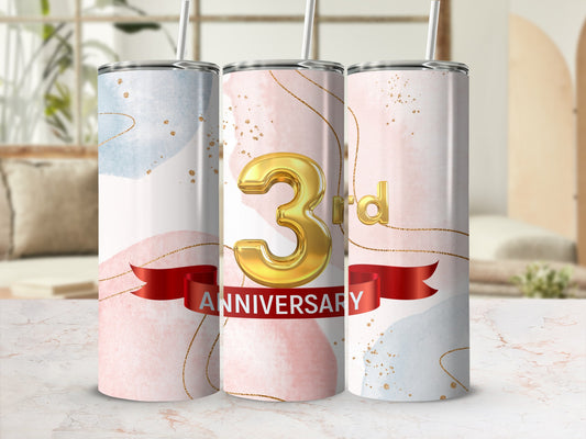 3rd Anniversary tumbler with gold ribbon and text.