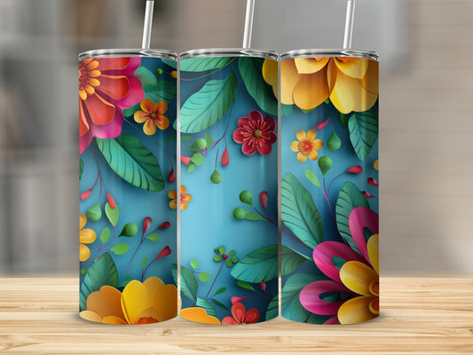 Three tumblers with a vibrant floral and leaf pattern on a blue background.