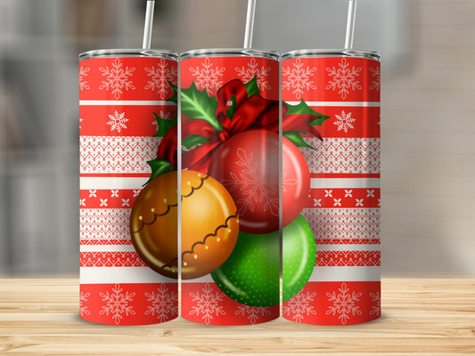 Three Christmas-themed tumblers with snowflakes and ornaments.