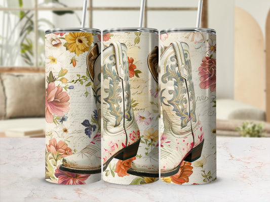 White cowboy boots with floral patterns on a distressed background.