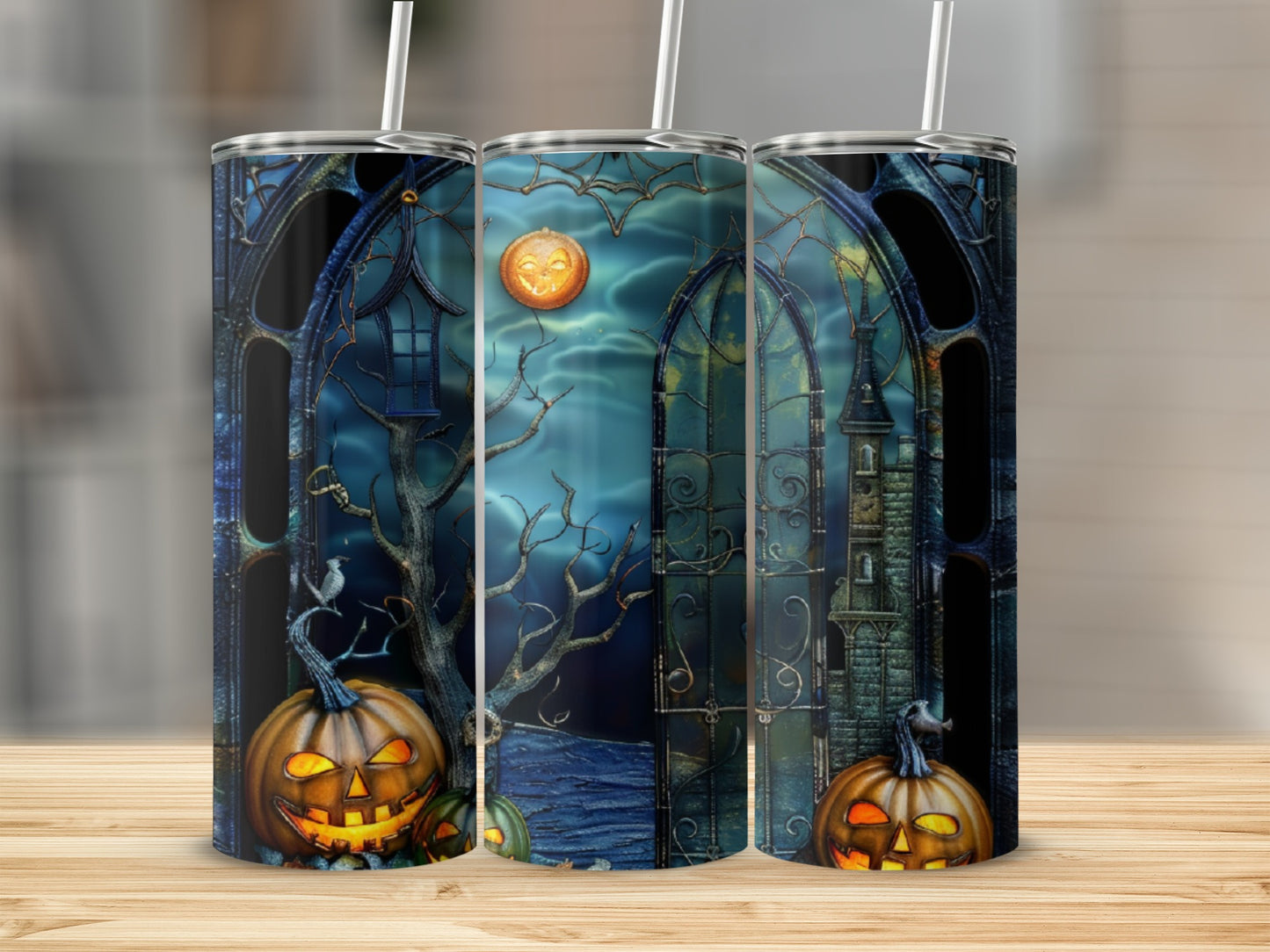 Halloween tumbler with pumpkins and a spooky castle scene.