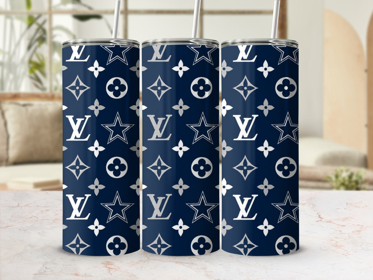 Three navy blue tumblers with white LV and star patterns and straws.