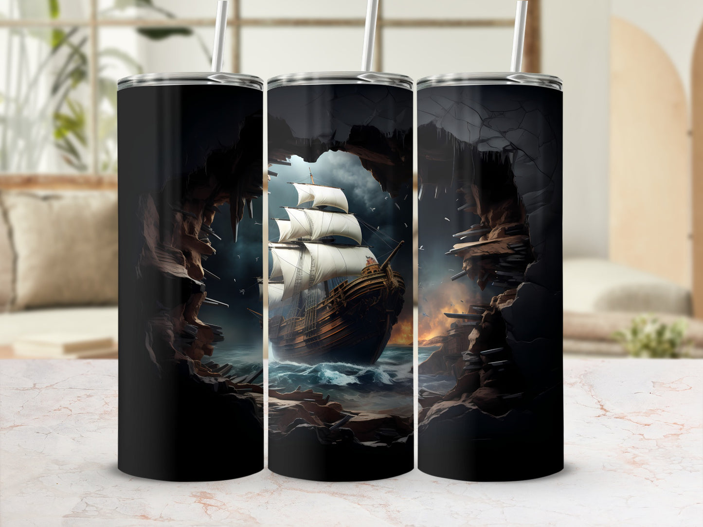 Triple tumbler design with a tall ship sailing through a rocky cavern.