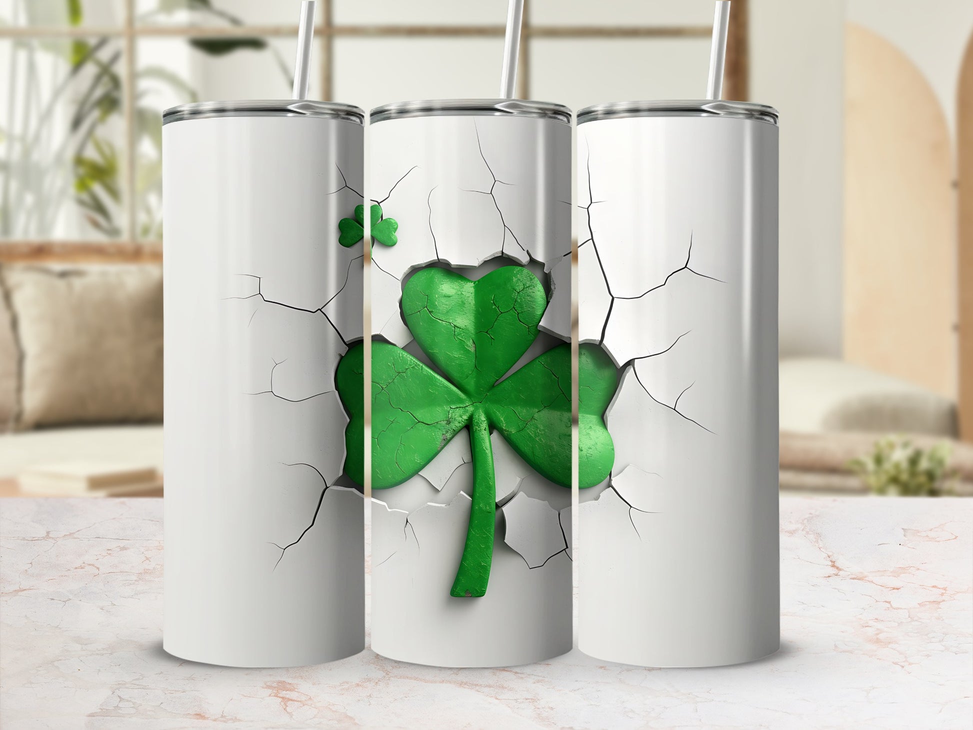 Three white tumblers with cracked texture revealing a green shamrock.