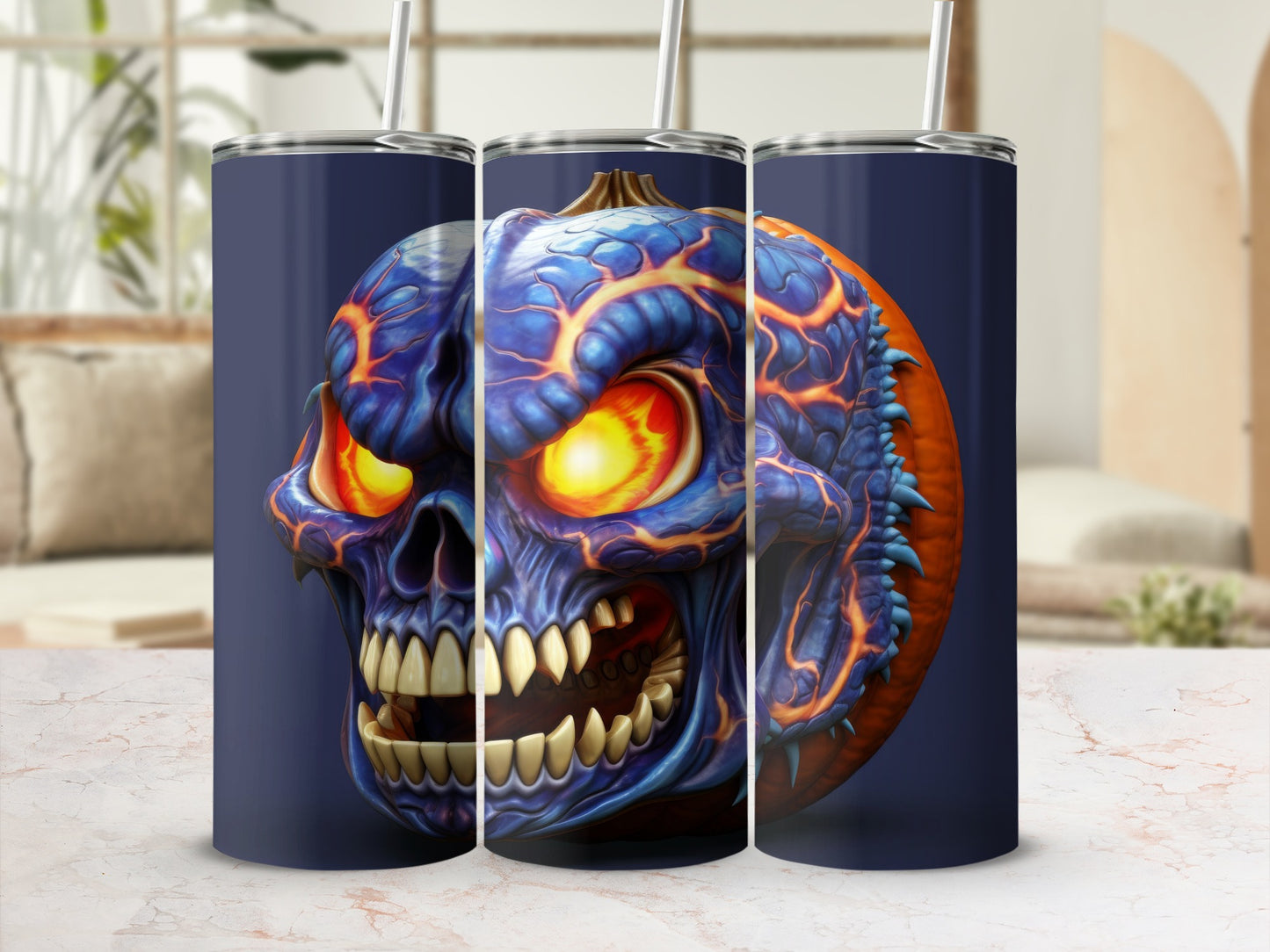 Three tumblers with a blue and orange fiery skull pumpkin design.
