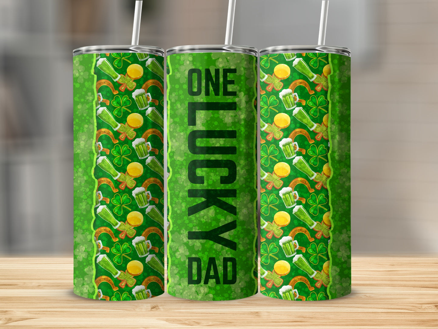 Green tumbler with shamrocks, horseshoes, and "One Lucky Dad" text.