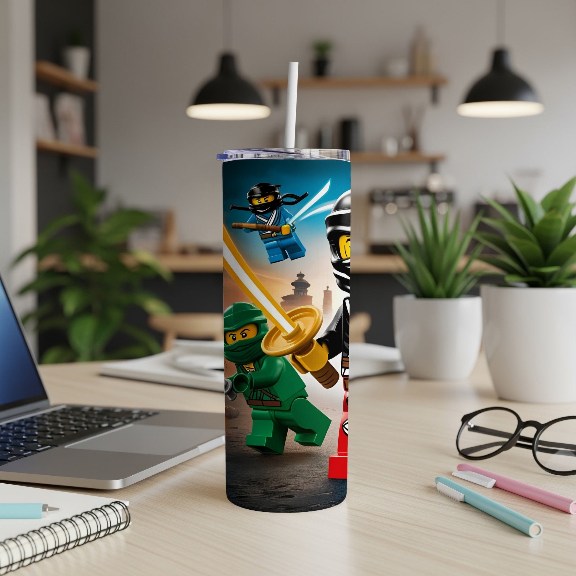 Green and black LEGO ninjas stand ready for action on a blue, patterned tumbler.