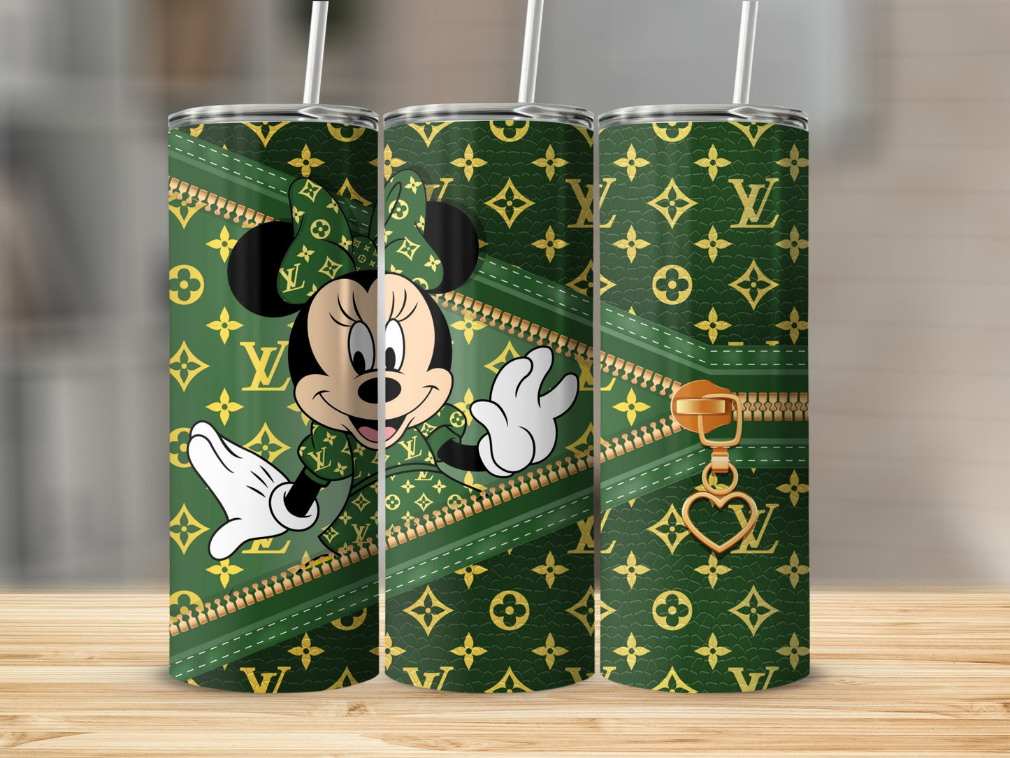 Minnie Mouse in Louis Vuitton print on a green tumbler with gold zipper detail.