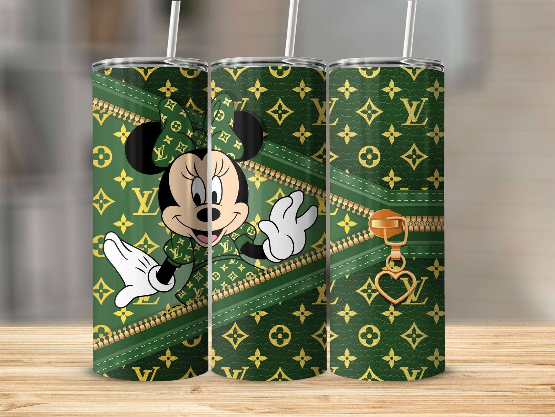 Minnie Mouse in Louis Vuitton print on a green tumbler with gold zipper detail.