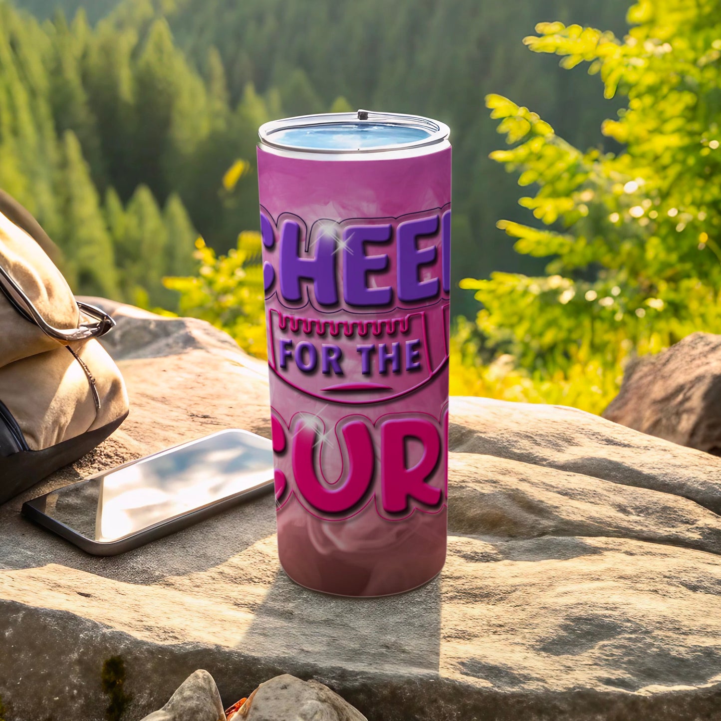 Pink and purple "Cheer for the Spo(r)" text on a tumbler cup.