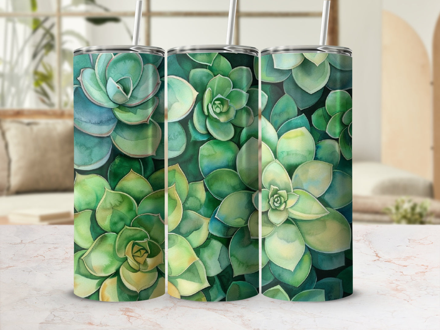 Three tumblers featuring a watercolor succulent pattern.