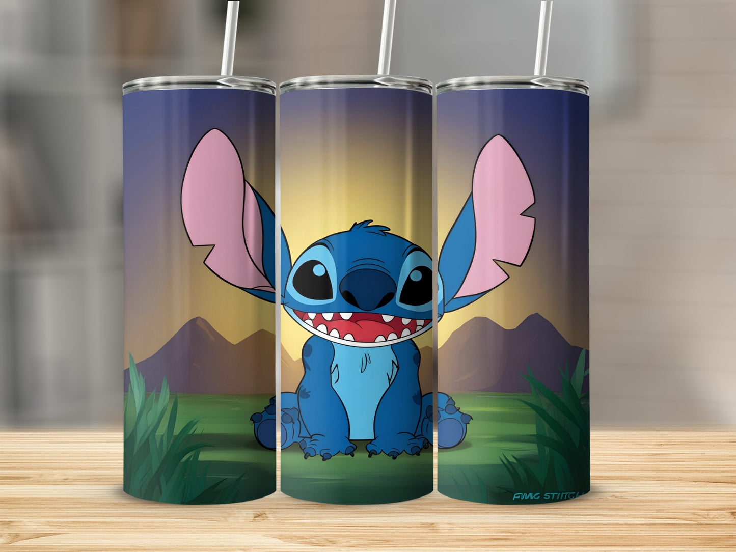 Stitch smiling from a grassy hill with mountains in the background.