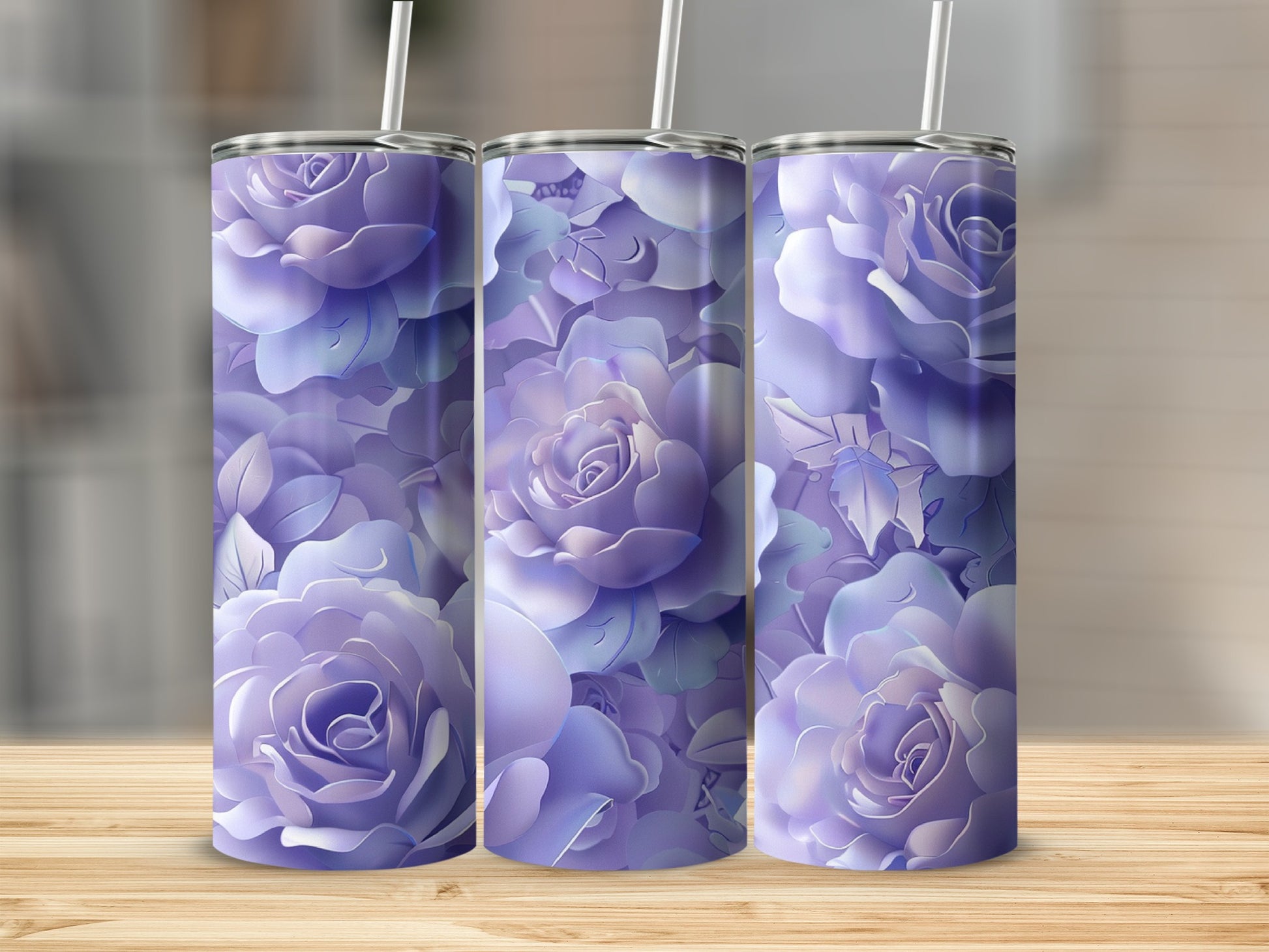 Three tall tumblers featuring a pattern of lavender and blue roses.
