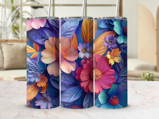 Three tumblers featuring a vibrant floral pattern in blues, pinks, and oranges.