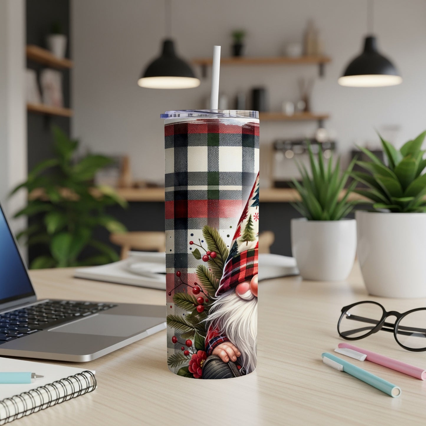 Christmas gnome tumbler with plaid pattern, berries, and pine sprigs.