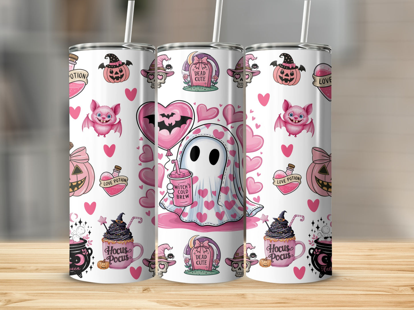 Pink Halloween tumblers with ghosts, bats, pumpkins, and witchy potions.