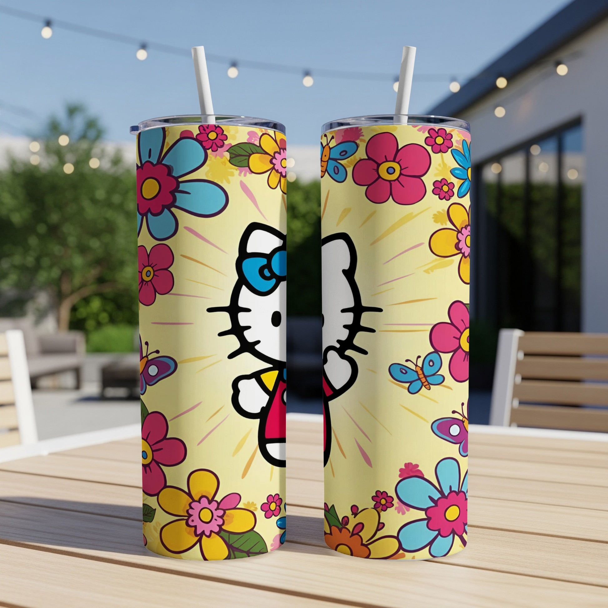 Hello Kitty design with butterflies and flowers on yellow background, two tumblers.
