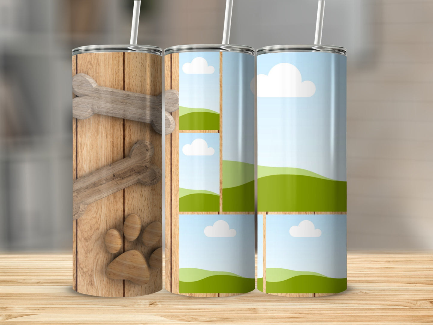 Three tumblers with dog bone and paw print designs.