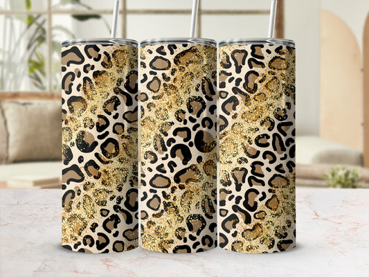 Three tumblers with leopard print and gold glitter design.