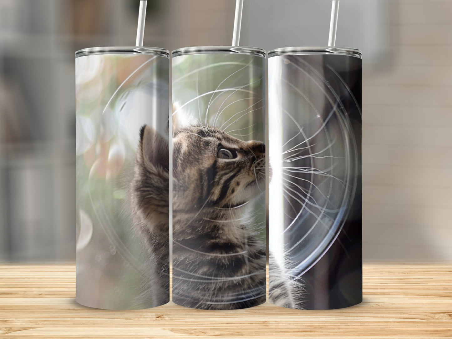Three tumblers featuring a tabby cat's face.