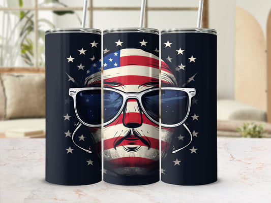 USA flag skull wearing sunglasses on a dark blue tumbler.