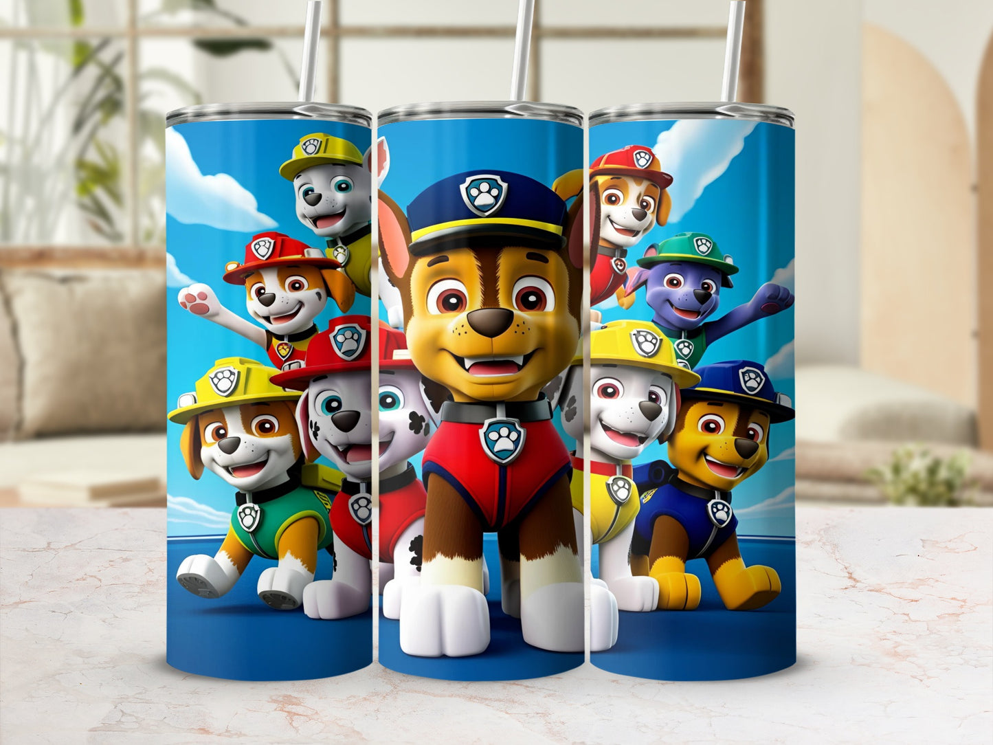 Paw Patrol characters Ryder and pups on blue tumblers with straw.