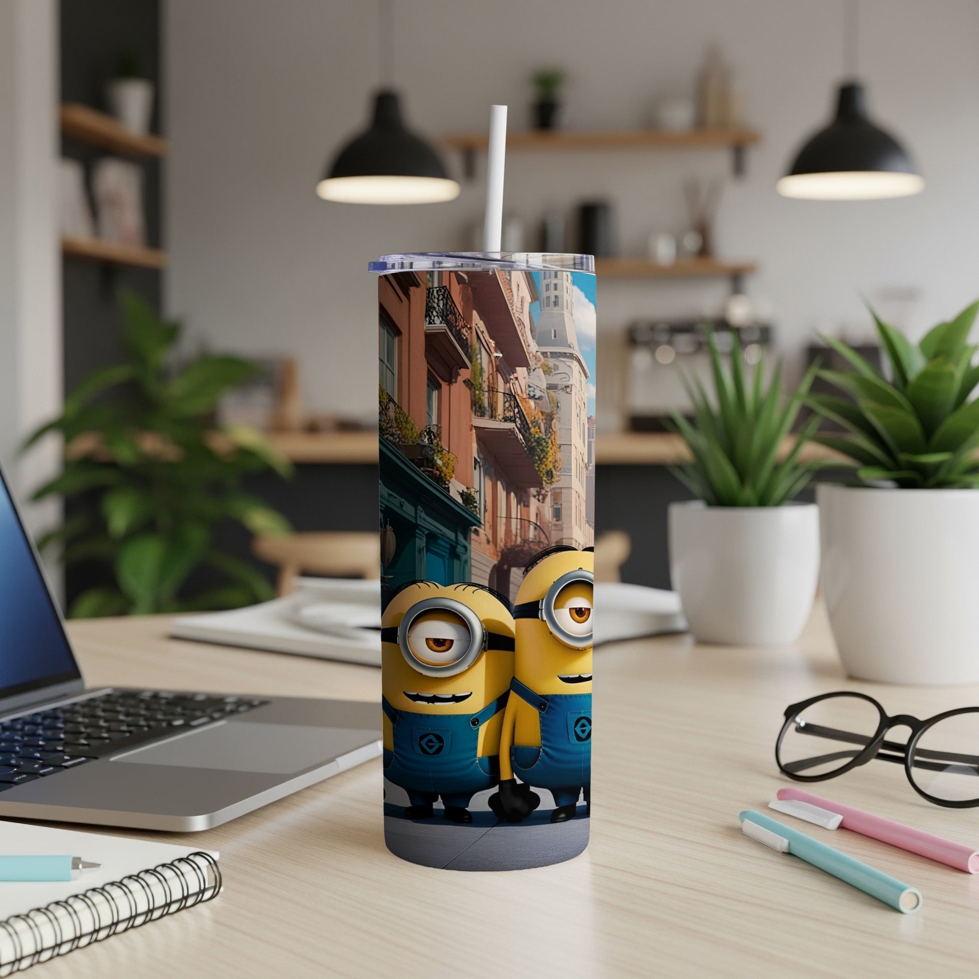Minions characters on a travel mug with a city street background.