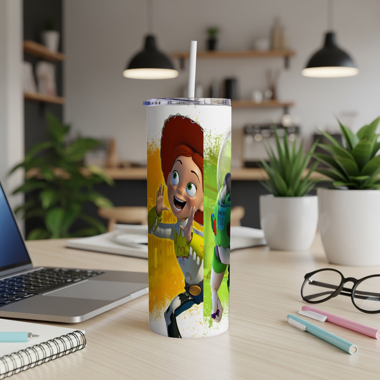Toy Story characters Jessie and Buzz Lightyear on a white tumbler with straw.