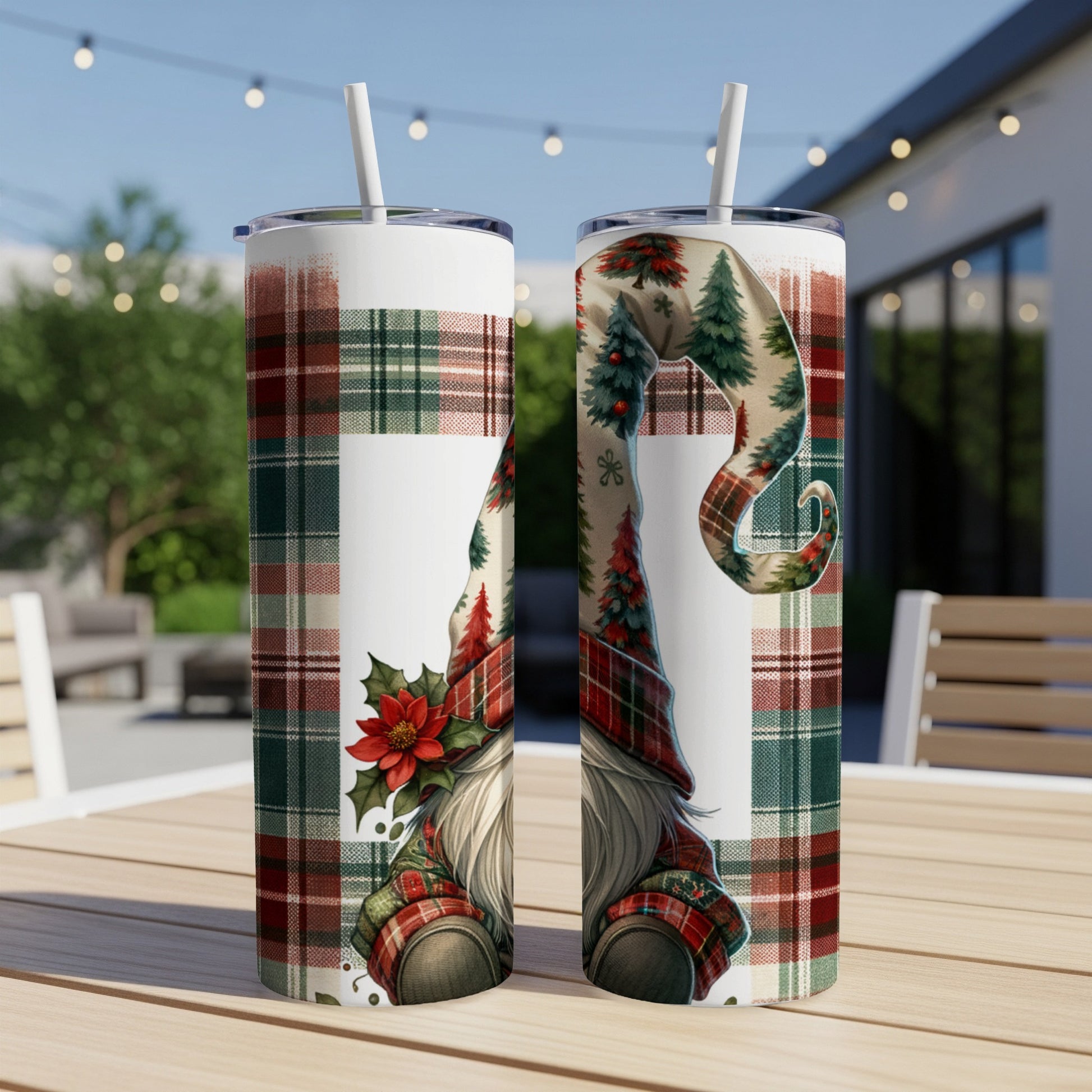 Two tumblers featuring a gnome with a plaid hat and Christmas trees.