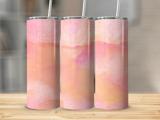 Three tumblers with abstract watercolor patterns in pinks and oranges.