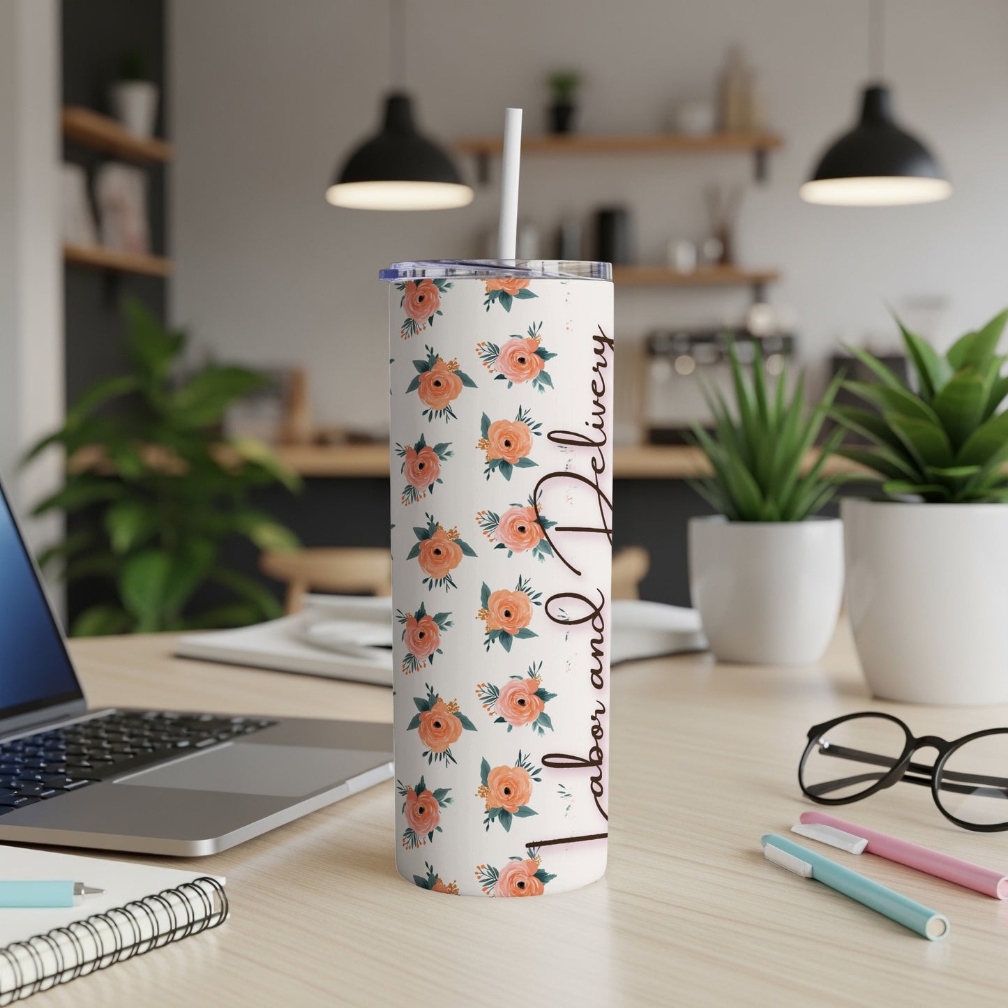 Floral tumbler with "Labor and Delivery" text and a straw.