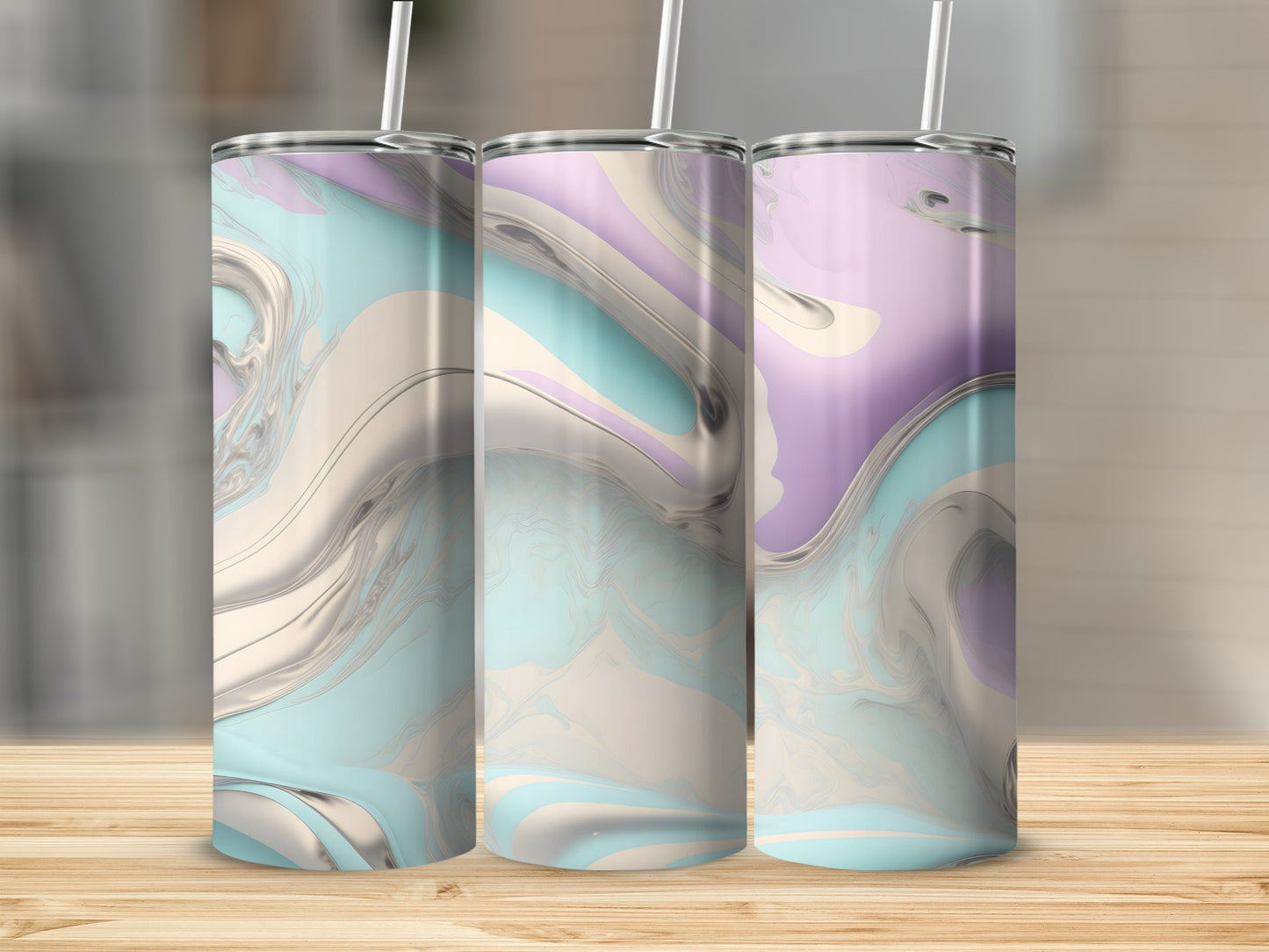 Three pastel marble-patterned tumblers with straws displayed on a wooden surface.
