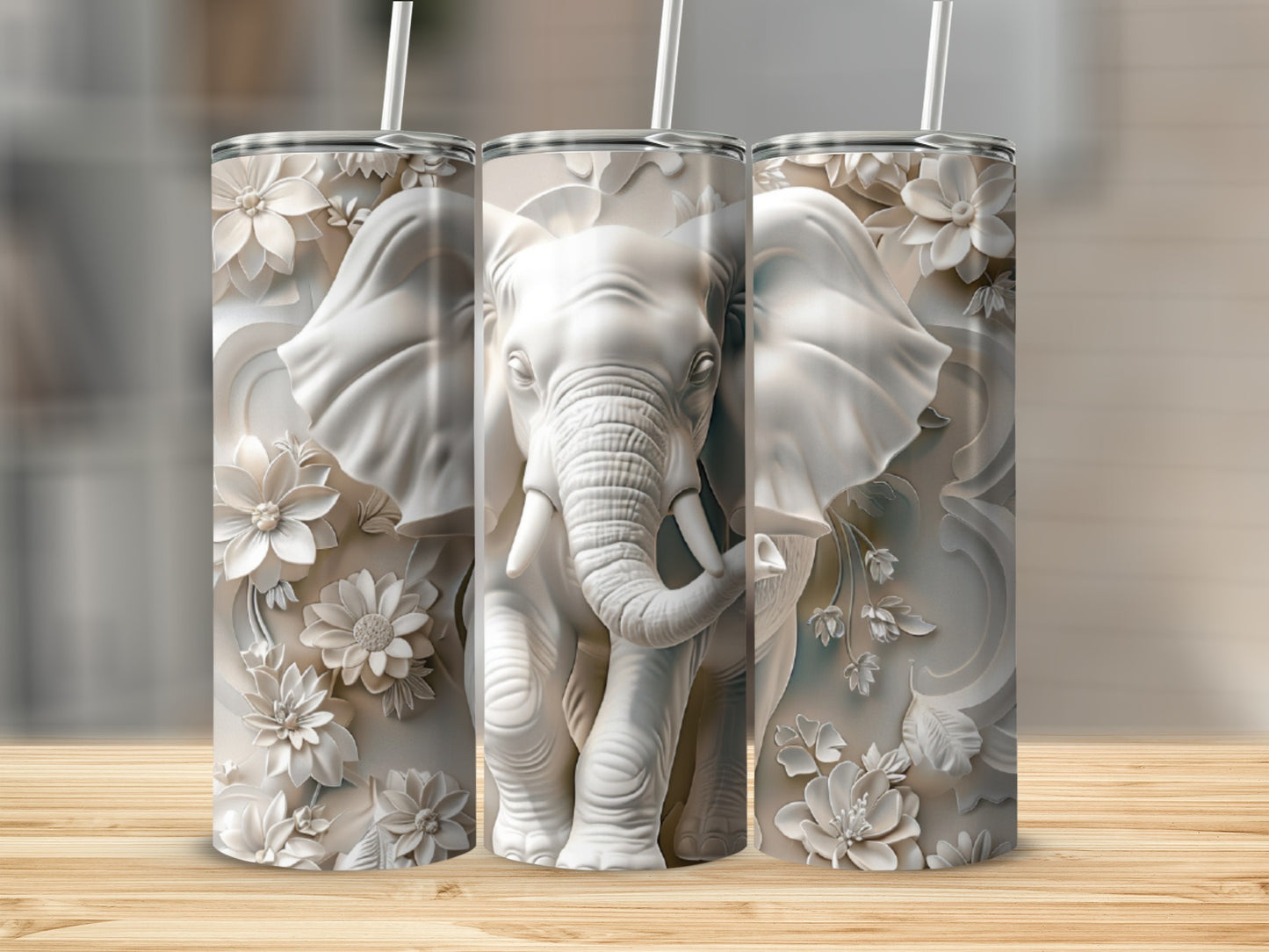 White elephant tumbler with floral relief design.