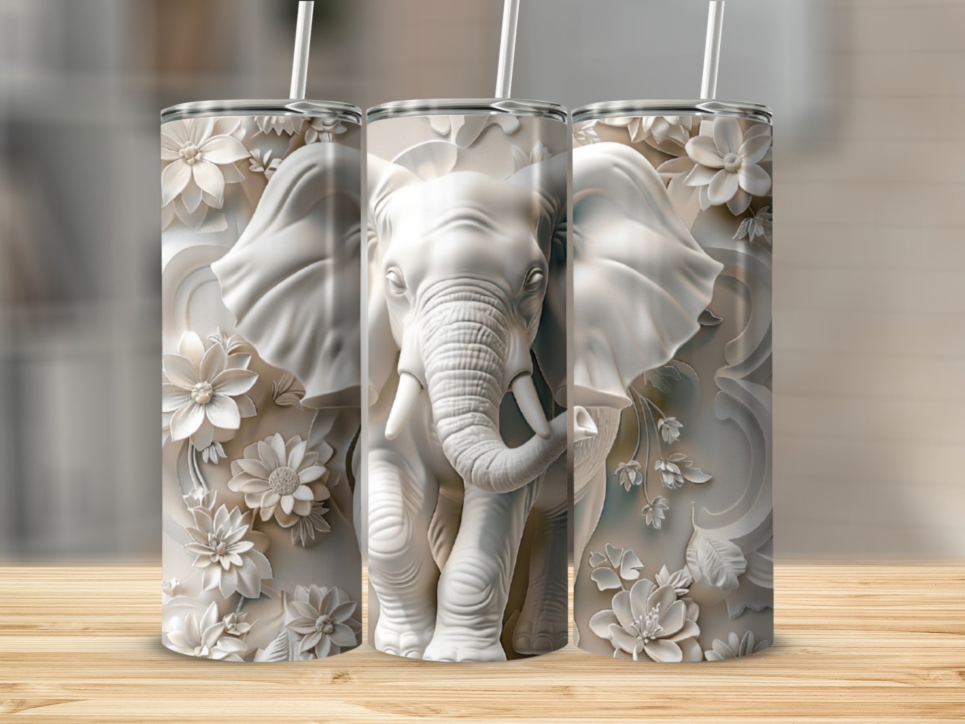 White elephant tumbler with floral relief design.