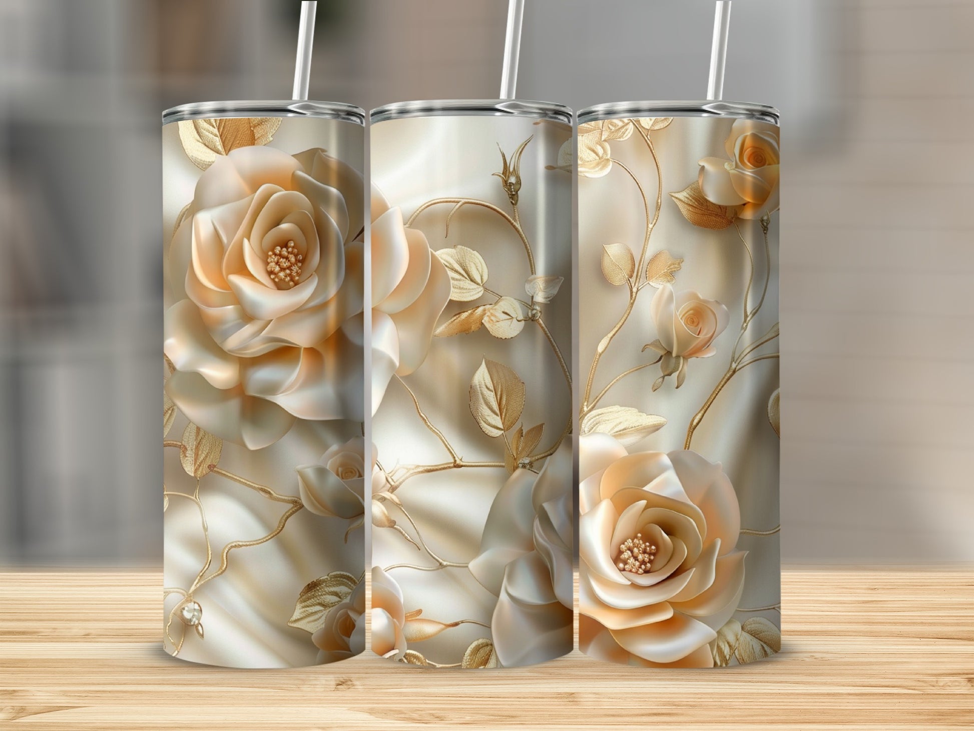 Three tall tumblers with embossed rose and leaf designs.
