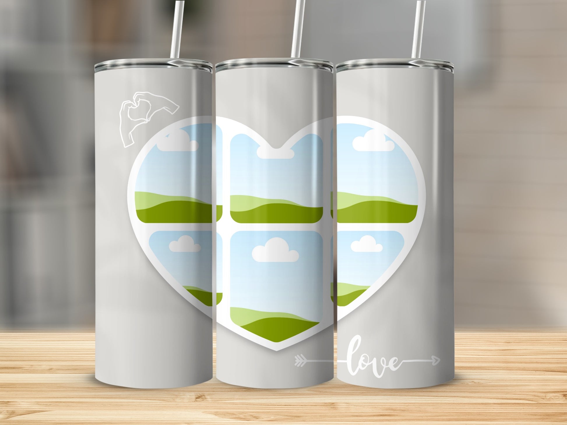 Gray tumblers with heart frame of landscapes and "love" text.