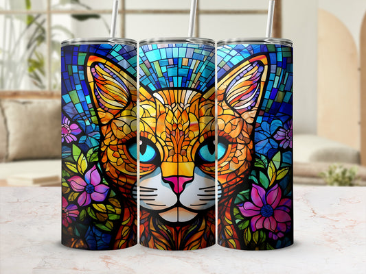 Three tumblers featuring a colorful stained-glass cat with blue eyes and floral accents.