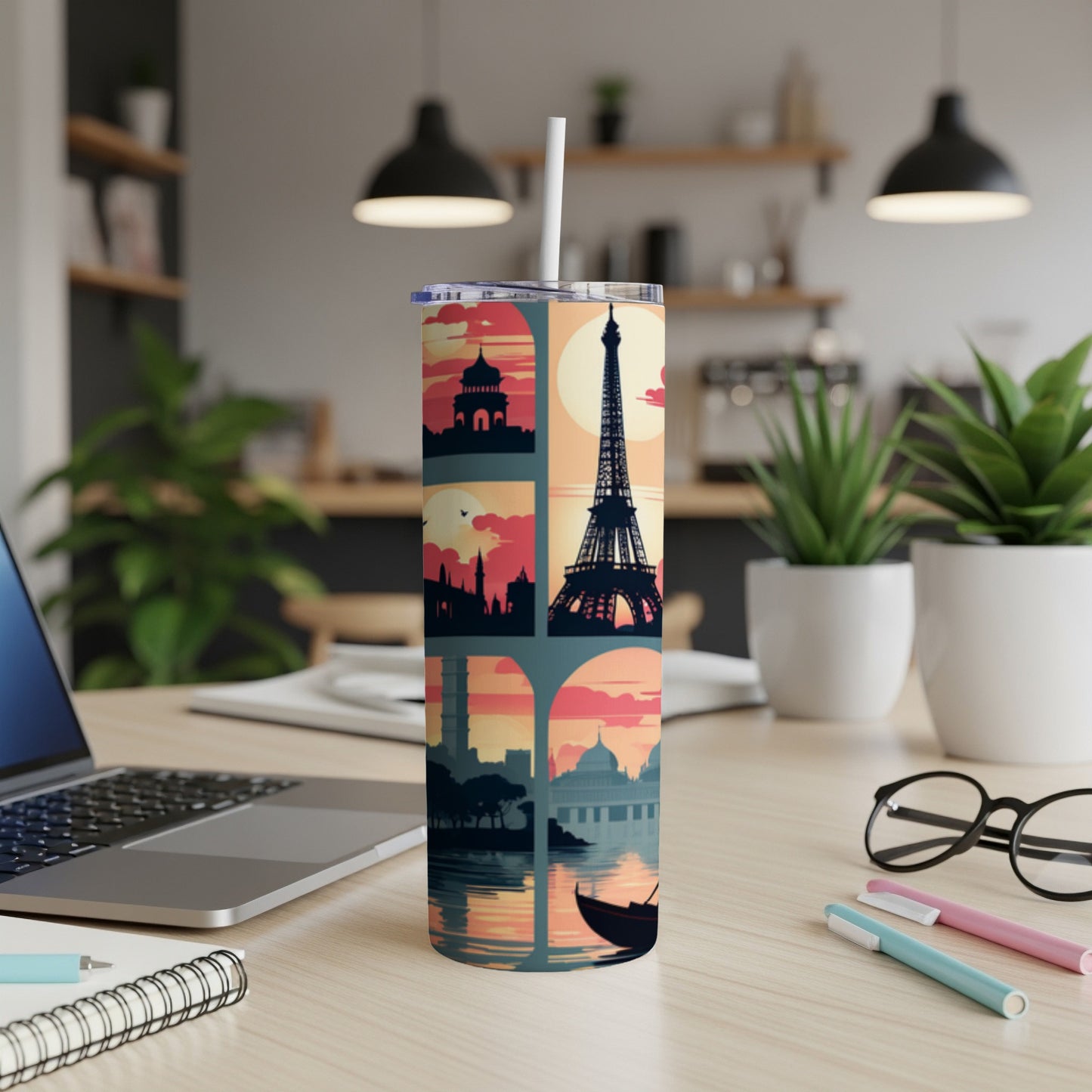 Travel tumbler featuring city skylines, Eiffel Tower, and sunset scene.