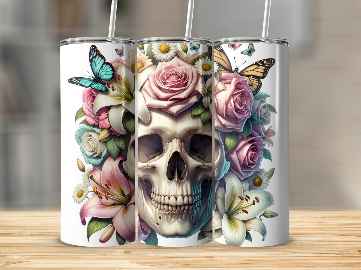 Skull with roses, lilies, daisies, and butterflies on a white tumbler.