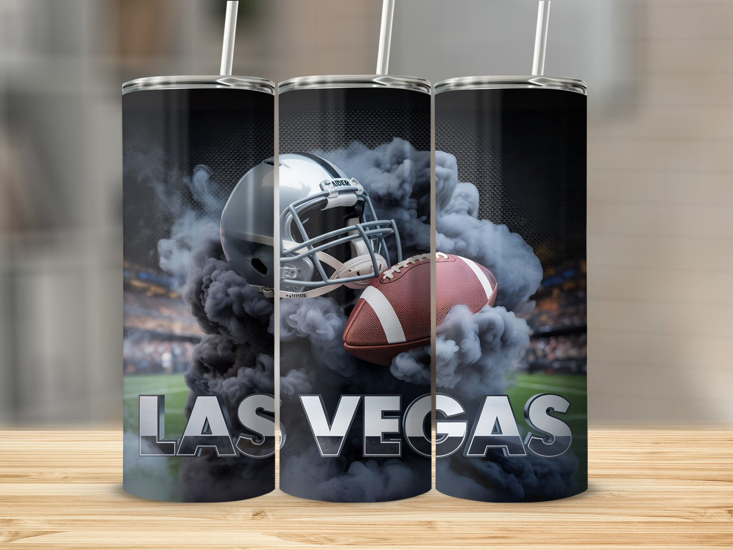 Las Vegas Raiders football helmet and ball amidst smoke.