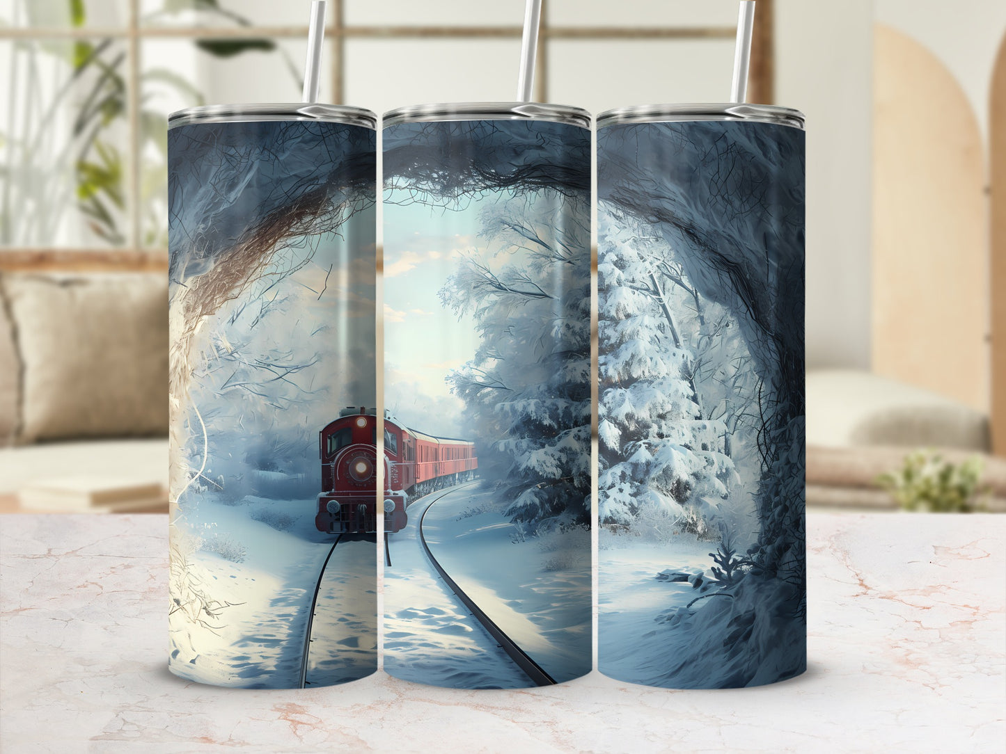Red train on snowy tracks in a forest landscape, displayed on three tumblers.